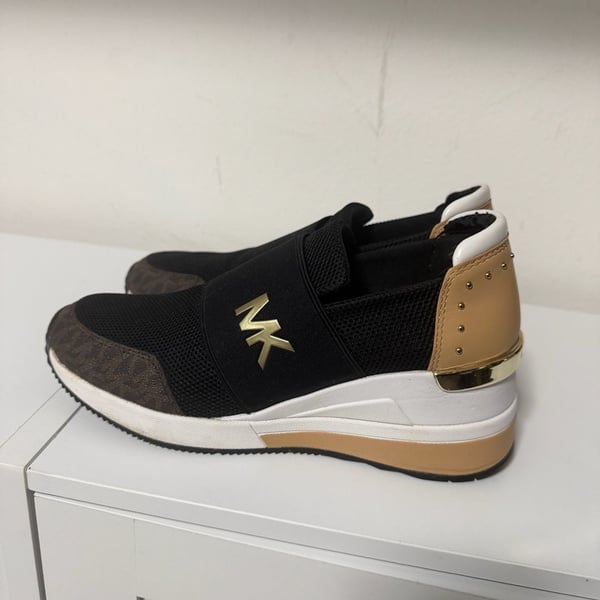 Michael Kors Black and Tan Wedge Slip-On Felix Trainers with Gold Accent