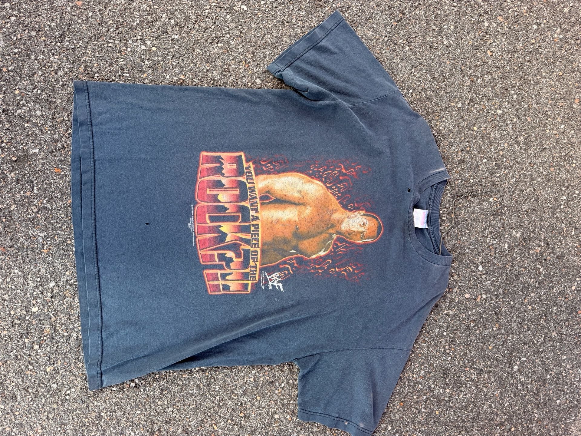 Vintage 2001 WWF "You Want a Piece of The Rock" wrestling tee.
2