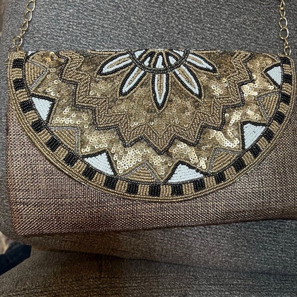 Fancy Party Clutch Hand Embroidered On Silk/Jute Material.