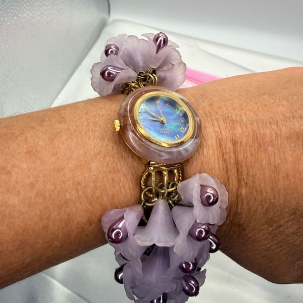 Bonetto Candy Watch Size 7.5 Purple Floral Resin Band needs battery 