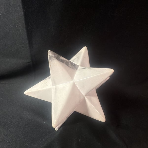Urban Trends Collection Faux White Marble Geometric 12 Point Star Table Decor