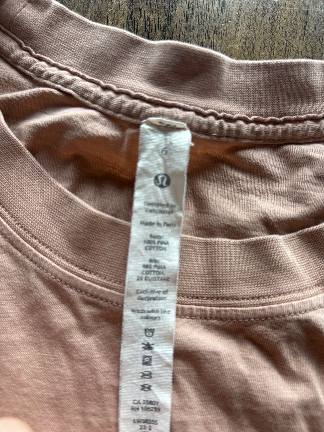 Lululemon Size 6 Pink Short Sleeve Tee with Back Seam and Stains 3