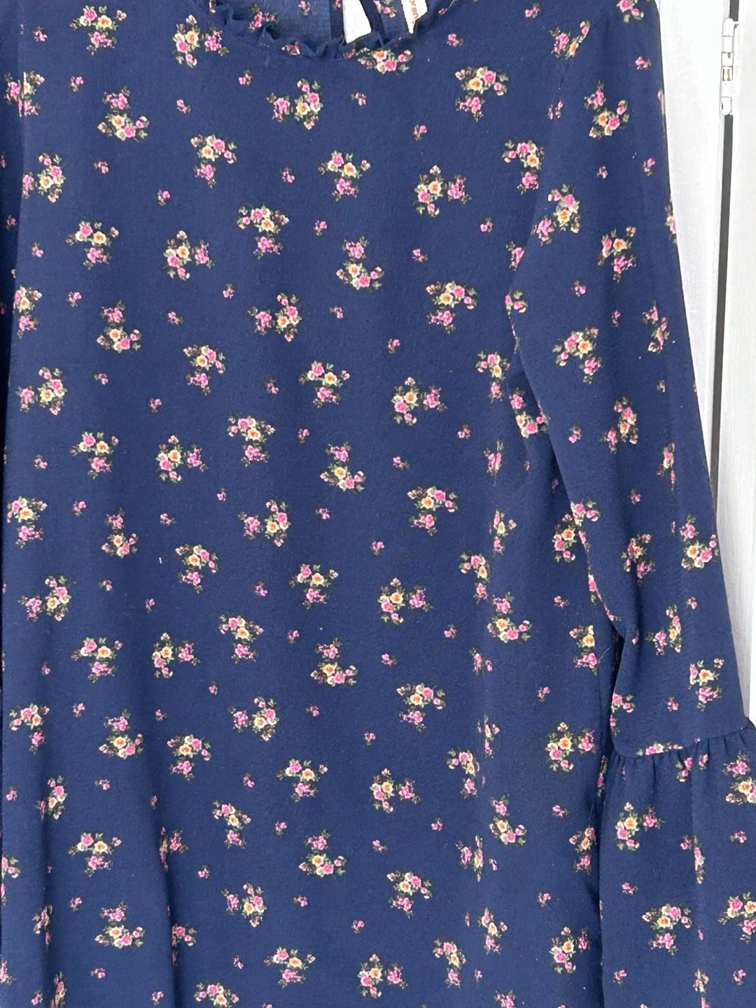 Orange Creek boho navy floral long sleeved blouse with ruffle collar and hem. 3