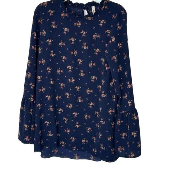 Orange Creek boho navy floral long sleeved blouse with ruffle collar and hem.