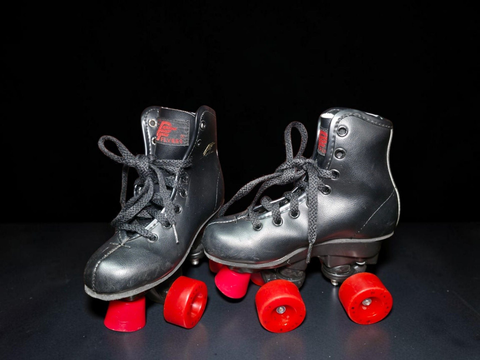 Flyers Black Quad Roller Skates with Red Wheels Size 11.5 kids 4