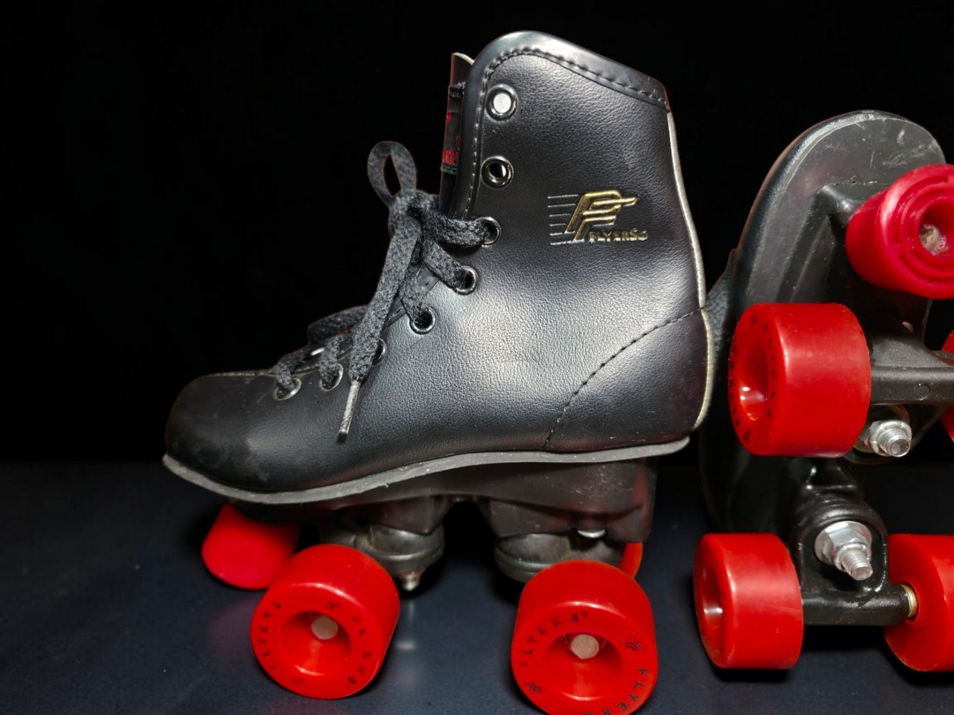 Flyers Black Quad Roller Skates with Red Wheels Size 11.5 kids 6
