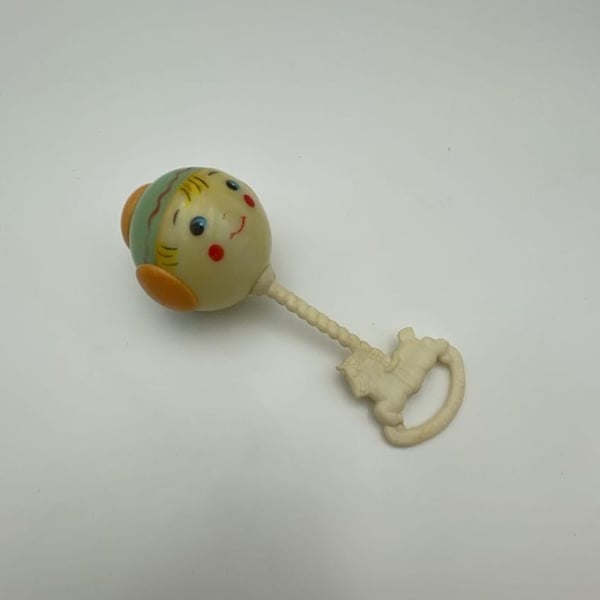 Vintage Baby Rattle with Face and Horse Handle Plastic Toy