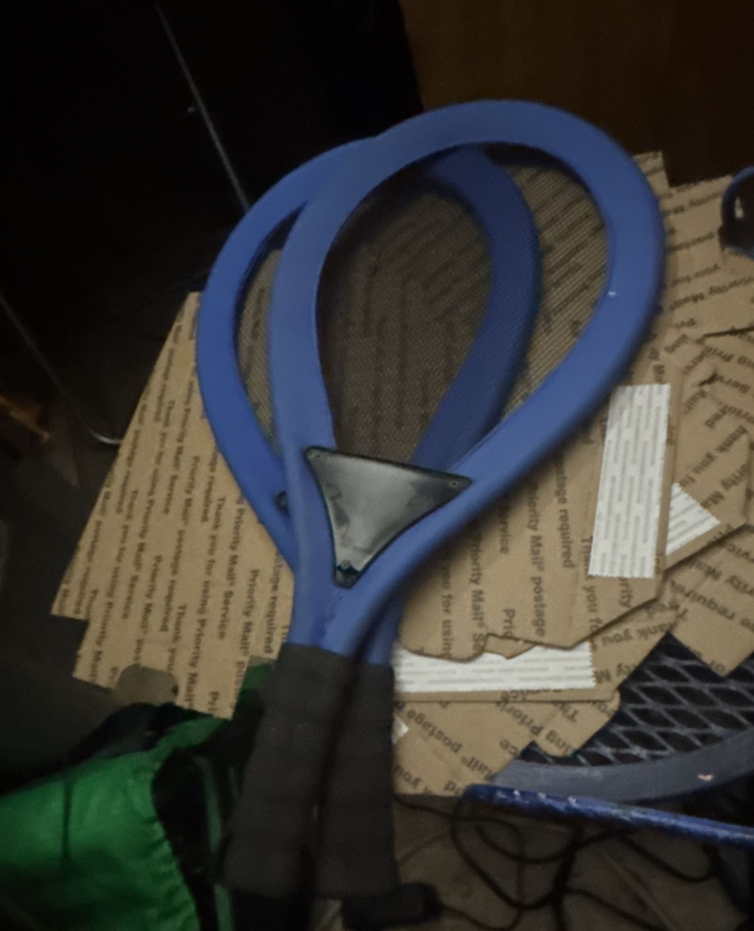 Blue Mesh Tennis Racket with Black Grip and Metal Plate 3
