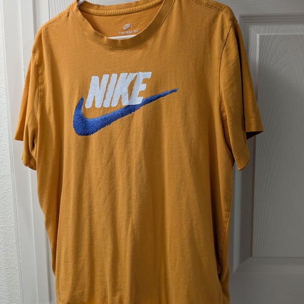 Nike The Nike Tee Yellow Short Sleeve Graphic T-Shirt