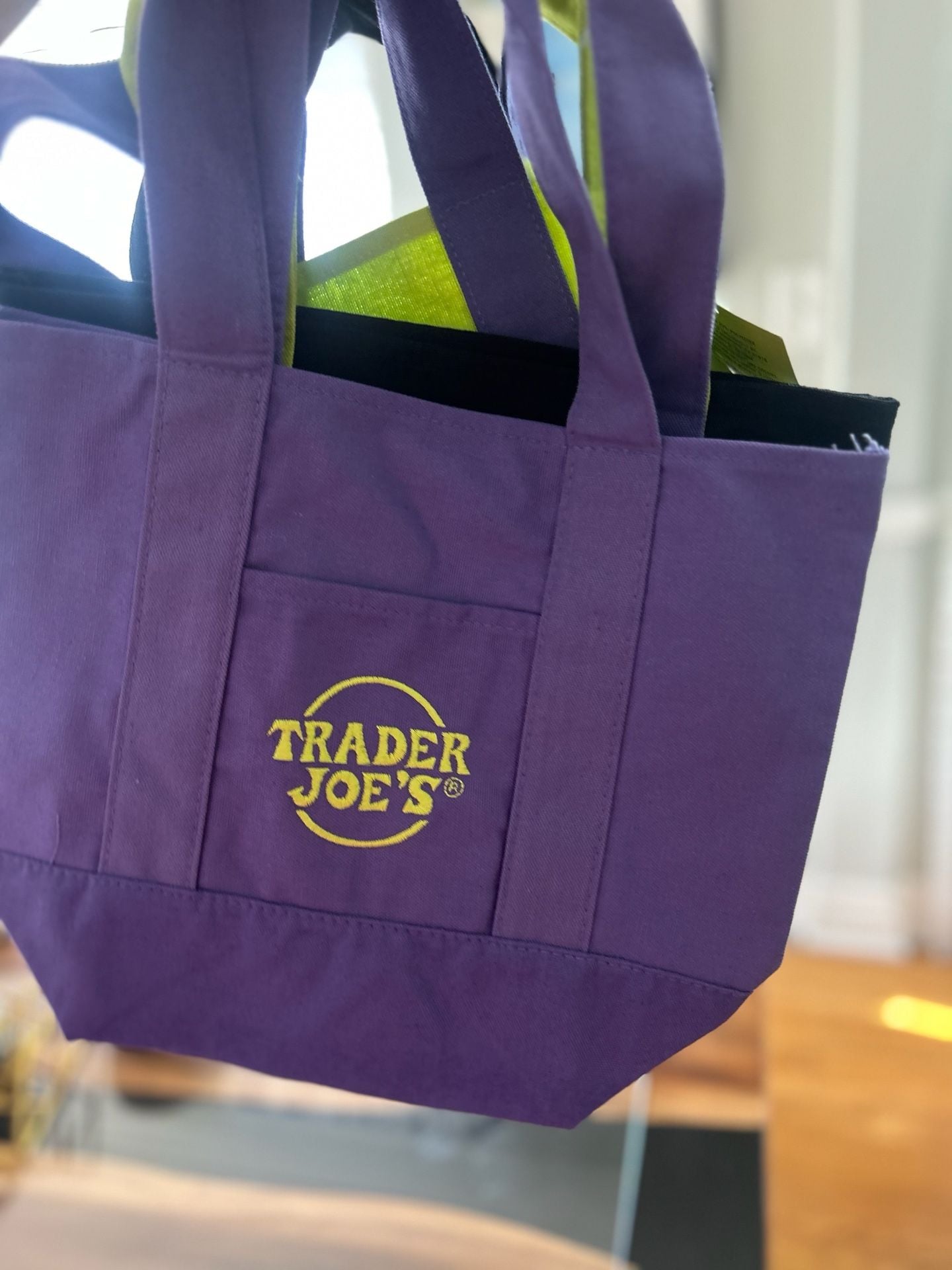 Trader Joe's Halloween Tote Bag Set of 2 Black, Purple Canvas and Neon lime green color featuring purple straps and black bottom panels . 4