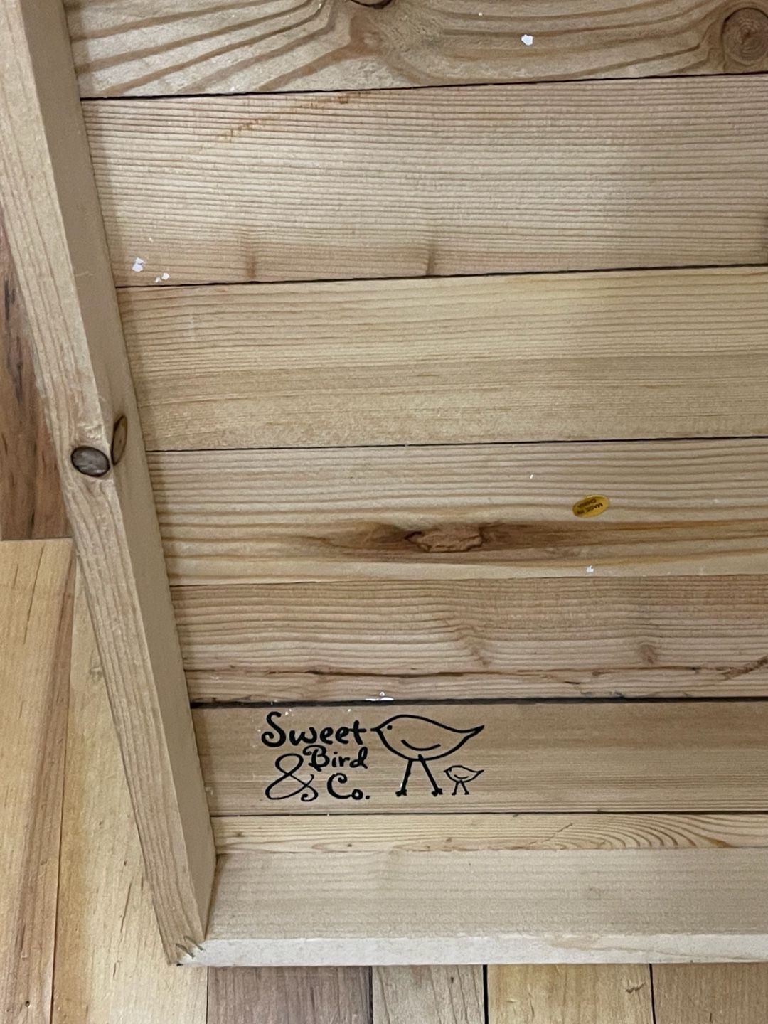 Sweet Bird & Co. Pallet Wood Sign In Our Home We Laugh We Share 2