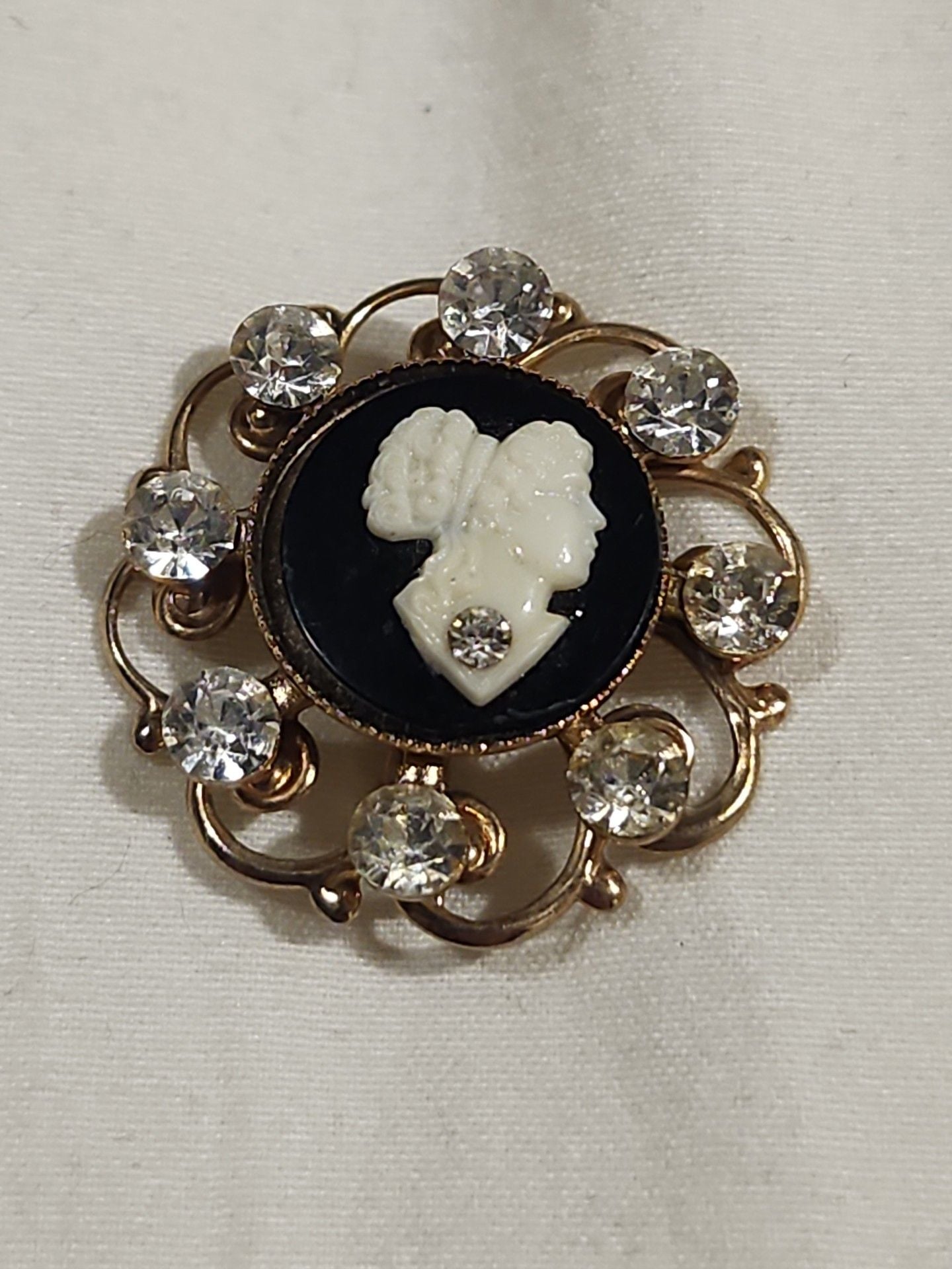 Vintage Gold Tone Cameo Brooch with Rhinestones and Black Background 2