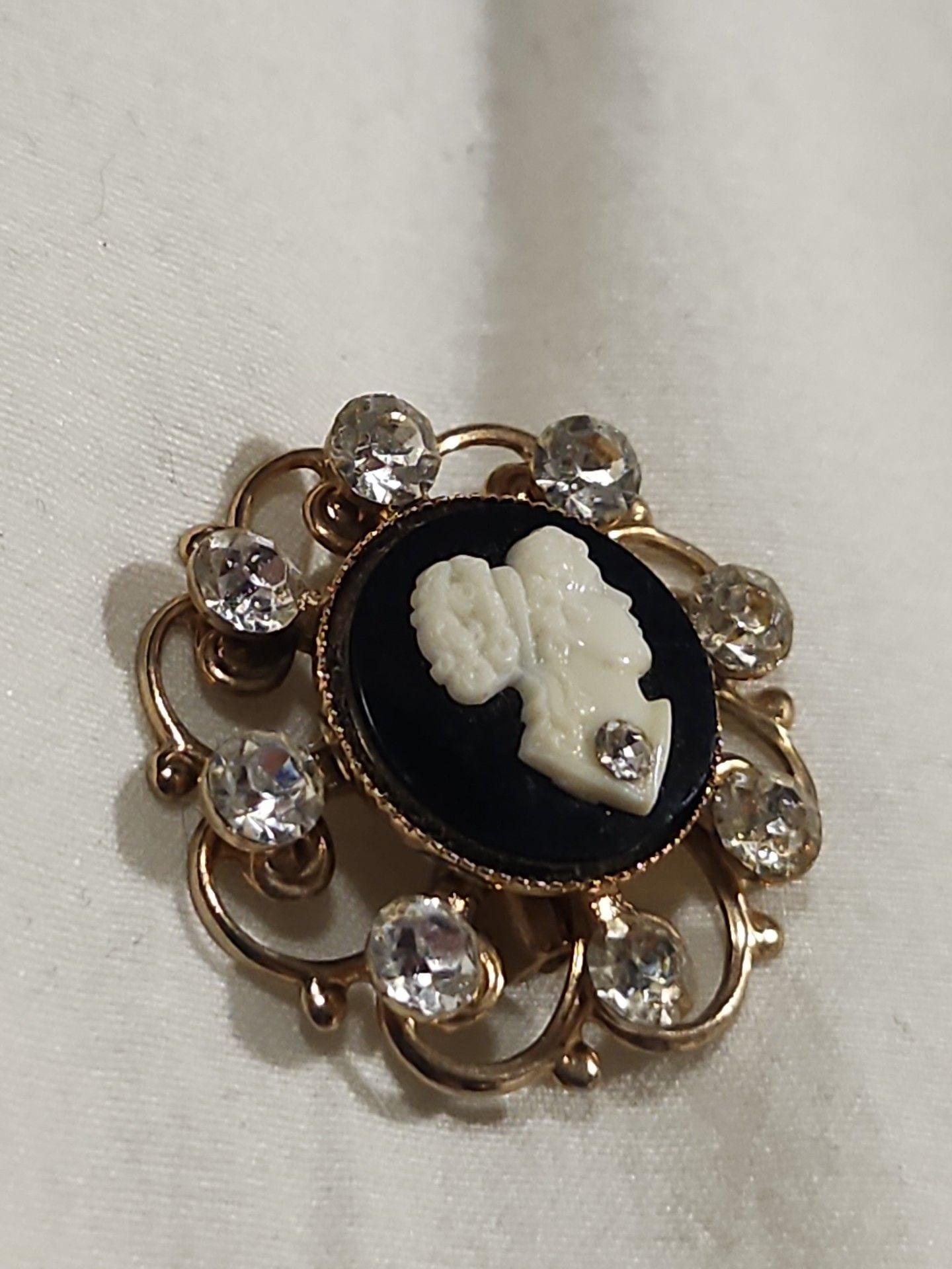 Vintage Gold Tone Cameo Brooch with Rhinestones and Black Background 3