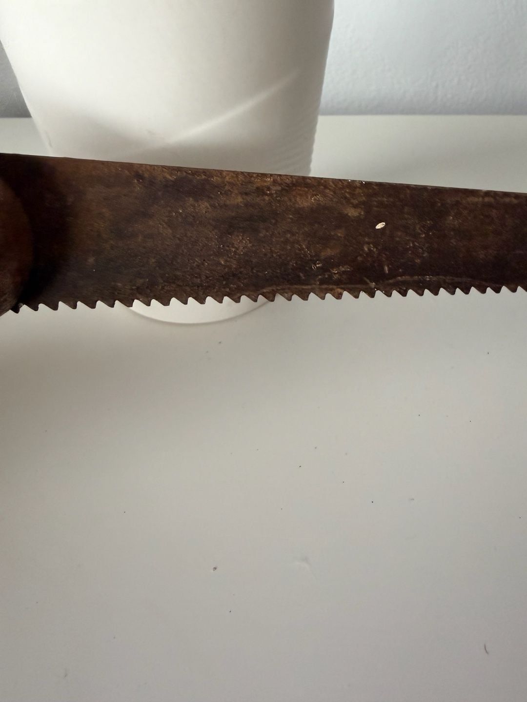 Vintage Keyhole Saw with Wooden Handle and Rusty Blade 9
