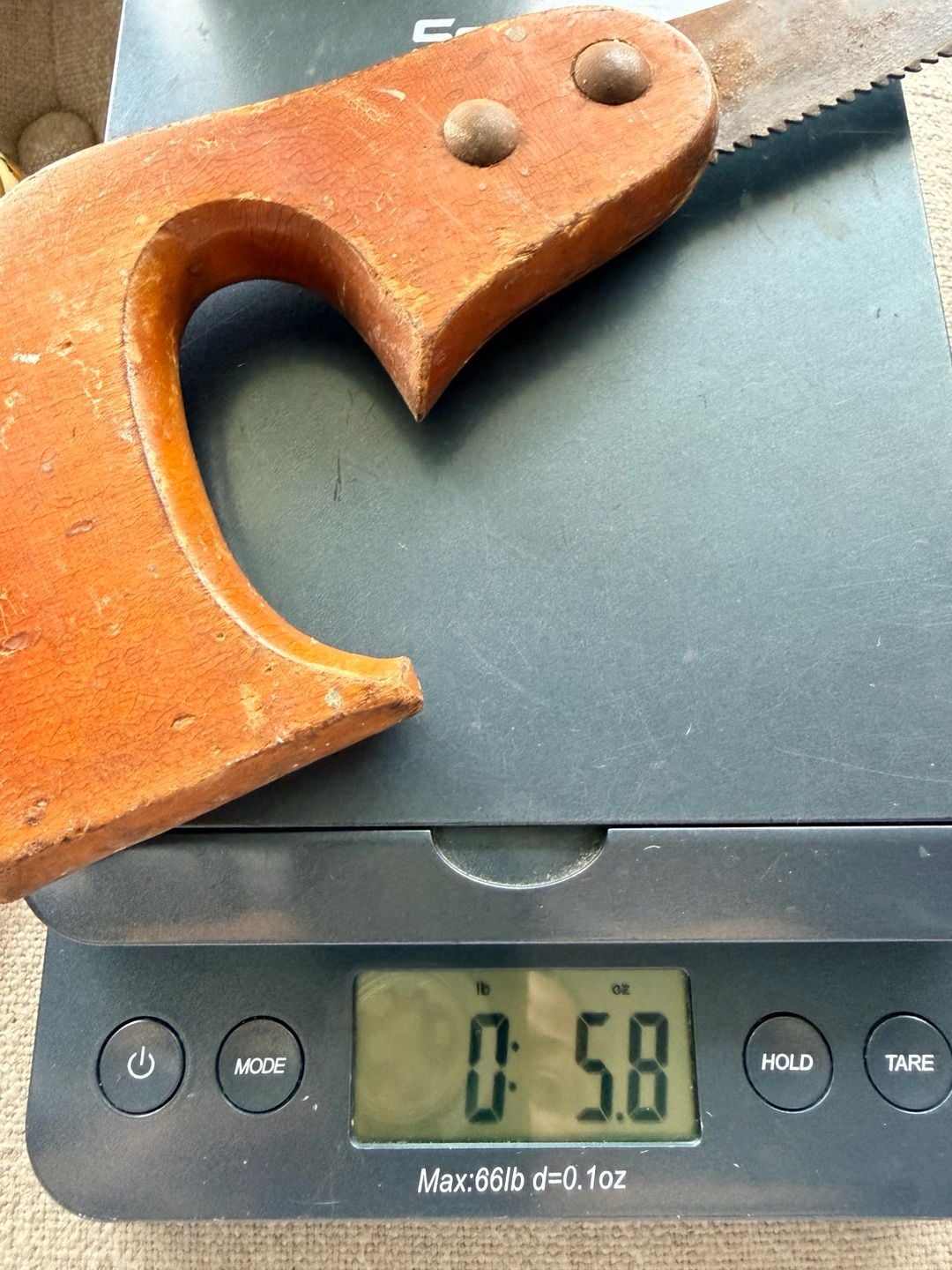 Vintage Keyhole Saw with Wooden Handle and Rusty Blade 10