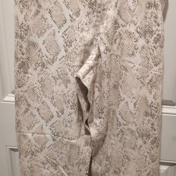 Neutral snakeskin wide leg low-rise baggy jeans...