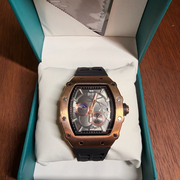 BiBi Rose Gold Tone Tonneau Skeleton Dial Black Rubber Watch