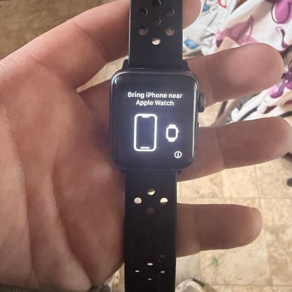 Apple Watch with Black Perforated Sport Band