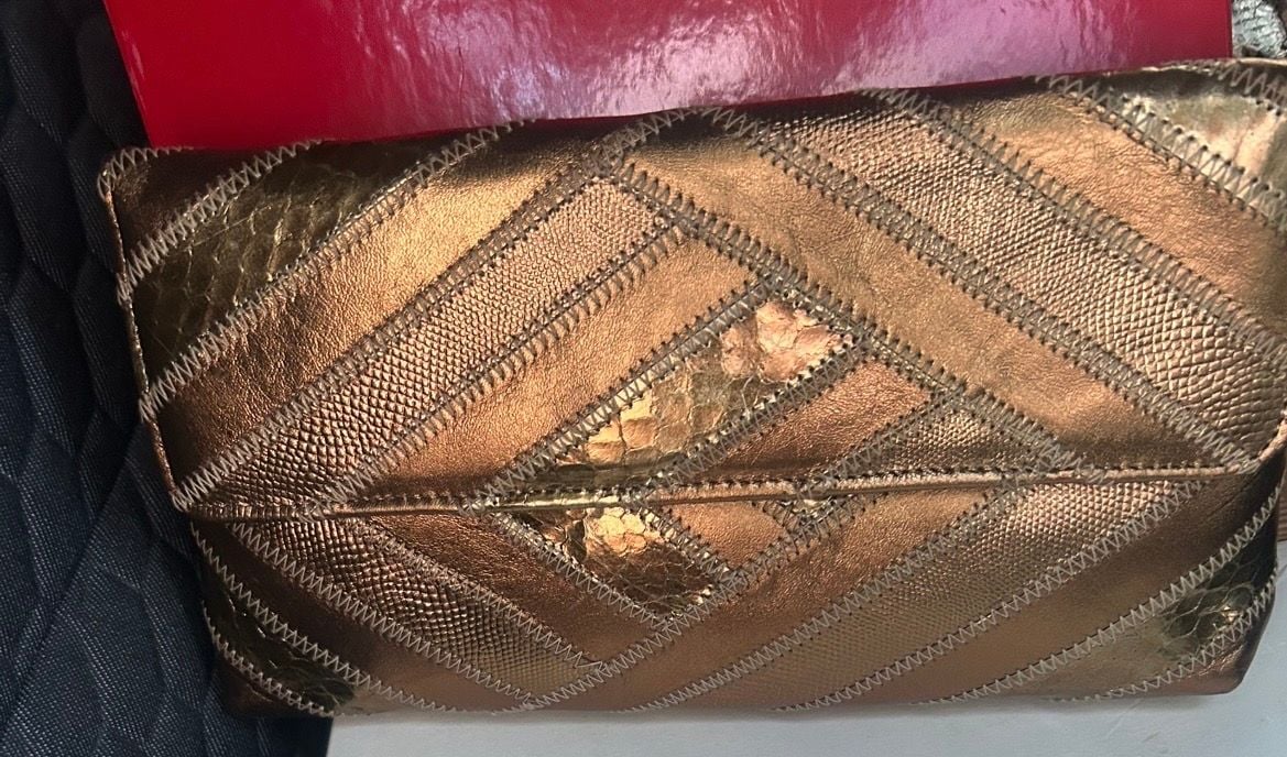 Gold Metallic Clutch Bag with Geometric Stitching and Embossed Pattern 1