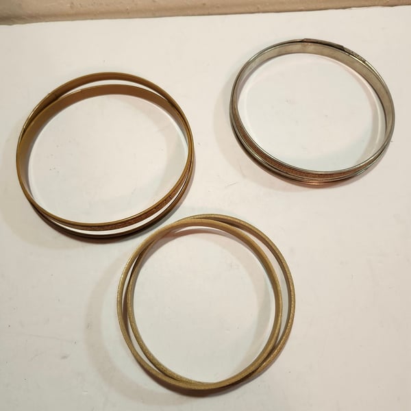 Unbranded 2 Metal Rings Bangle Bracelets and smaller wooden ring.