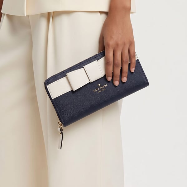 Kate Spade Navy Blue and White Bow Zip Around Wallet