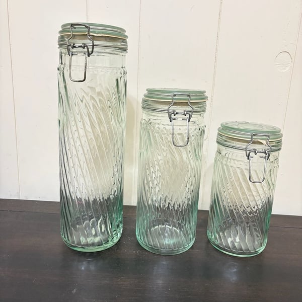 Vtg set 3 glass swirl canisters staggered, 13,9&8” inch jars