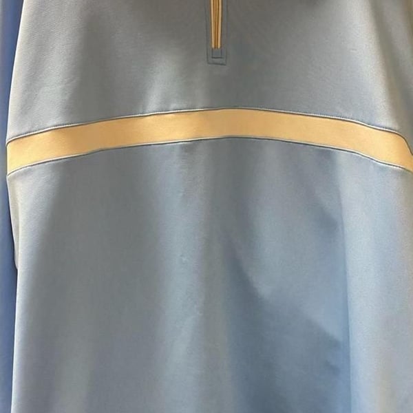 Dunning Golf - Half Zip Airy Blue Nylon throw over.  Timber Banks Logo on the sleeve. 