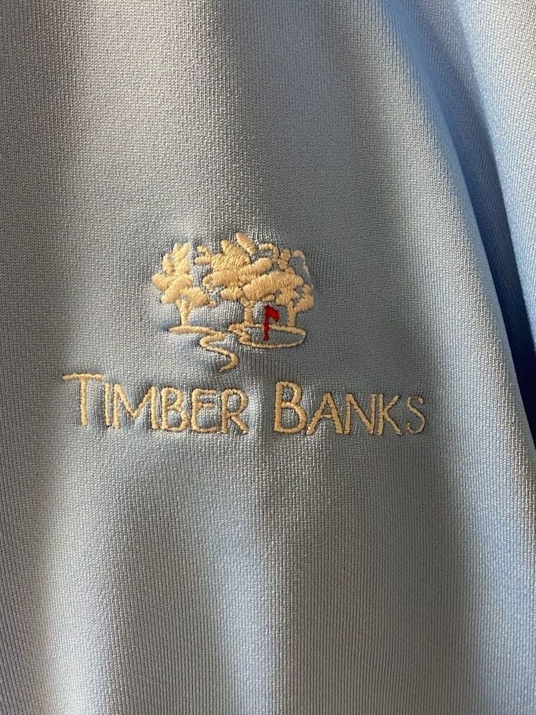Dunning Golf - Half Zip Airy Blue Nylon throw over.  Timber Banks Logo on the sleeve.  10