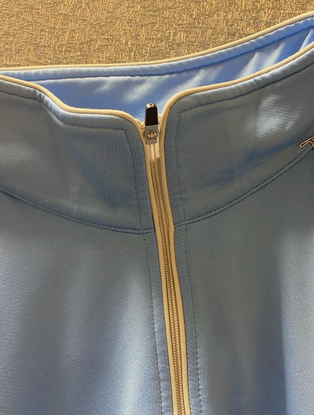 Dunning Golf - Half Zip Airy Blue Nylon throw over.  Timber Banks Logo on the sleeve.  12