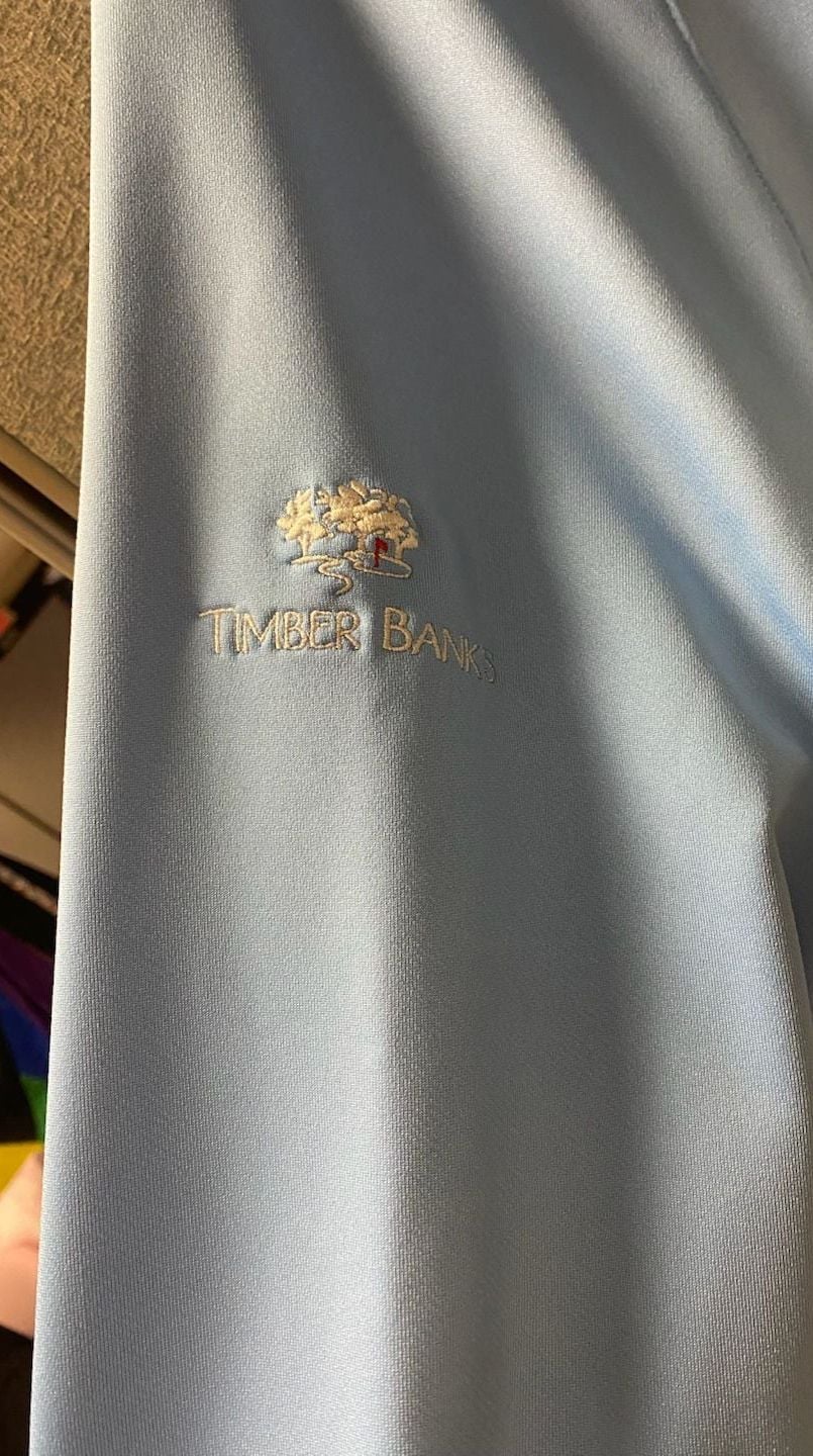 Dunning Golf - Half Zip Airy Blue Nylon throw over.  Timber Banks Logo on the sleeve.  11