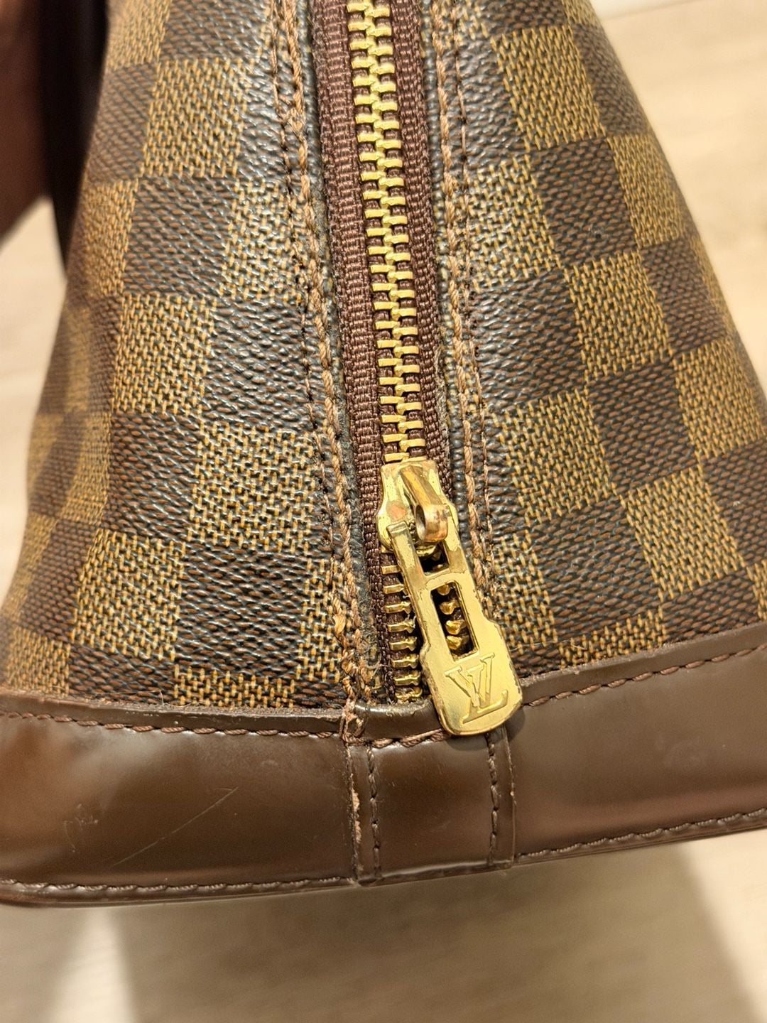 Louis Vuitton Damier Ebene Alma Handbag 7