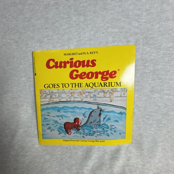 Scholastic Curious George Goes to the Aquarium Paperback Book 1984