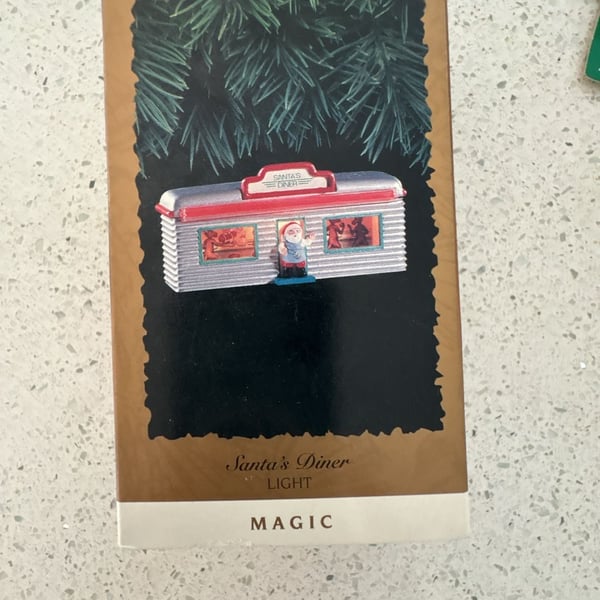 New Hallmark Santa's Diner Magic Light Christmas Keepsake Ornament 1995 NIB
Never been opened