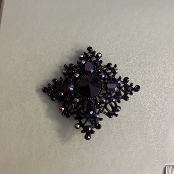 Vintage Black Japanned Rhinestone Filigree Brooch