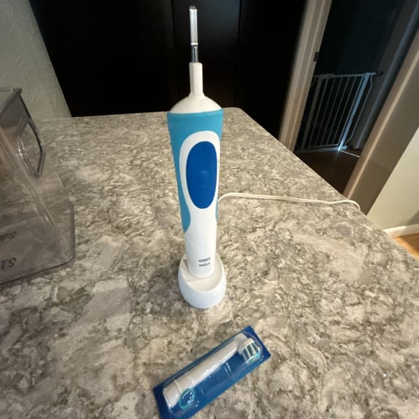 Oral-B Vitality Electric Rechargeable Toothbrush with Charger and Head