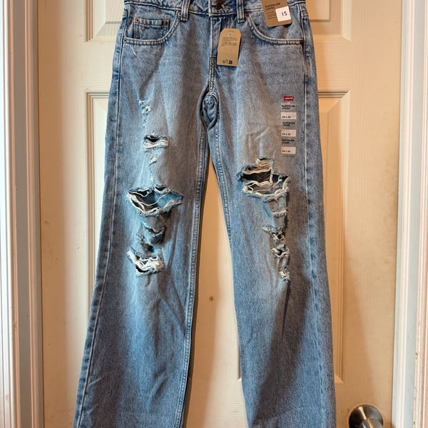 NWT Levis Superlow Loose Size 24x32 Distressed Denim Jeans