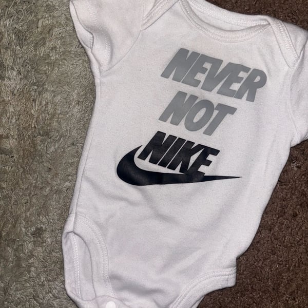 Nike 0-3 month body suit new
