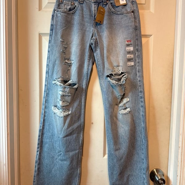 NWT Levi's Superlow Loose Jeans Size 24x32 Ripped Light Wash Straight Leg