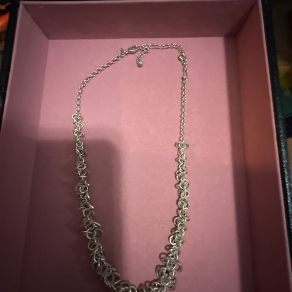 Avon Silver Tone Multi Loop Rings Cluster Necklace