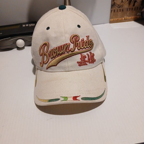 Dinos Brown Pride Embroidered White Dad Hat