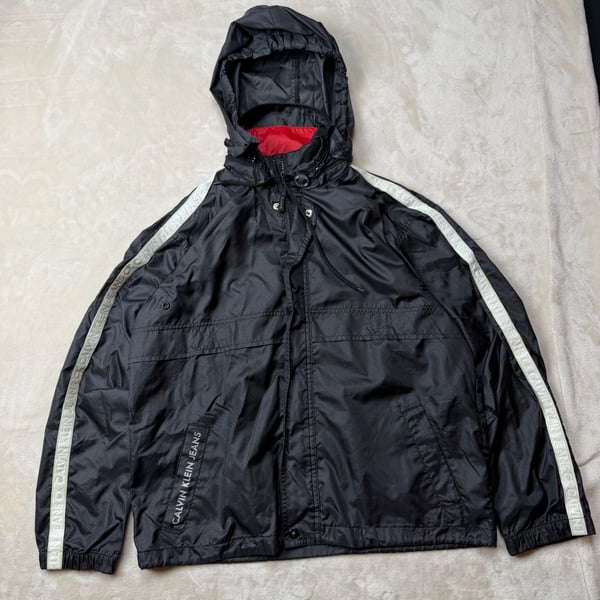 Vintage 1990โs Calvin Klein Jeans Windbreaker Jacket Size S Black Logo Hooded