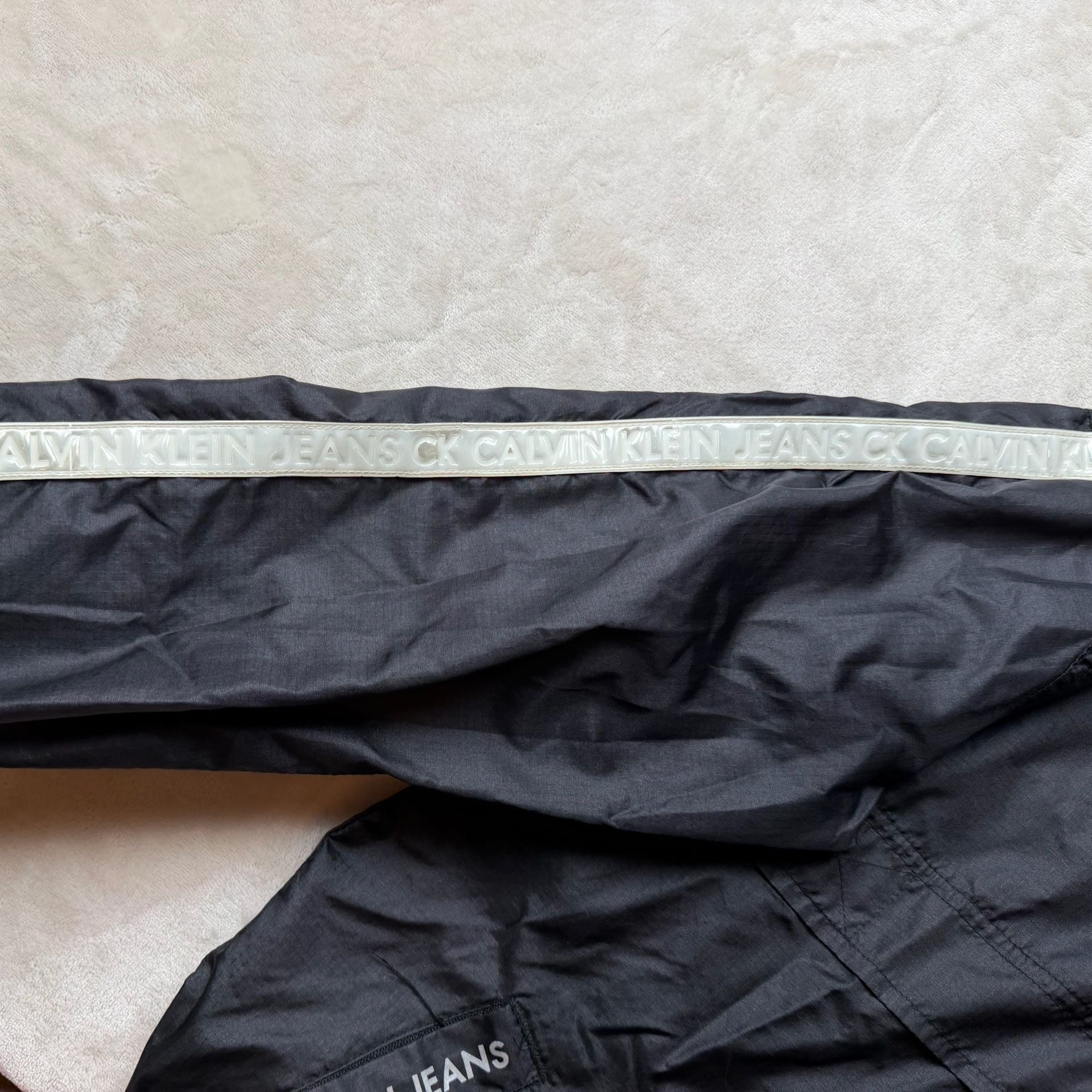 Vintage 1990’s Calvin Klein Jeans Windbreaker Jacket Size S Black Logo Hooded 9