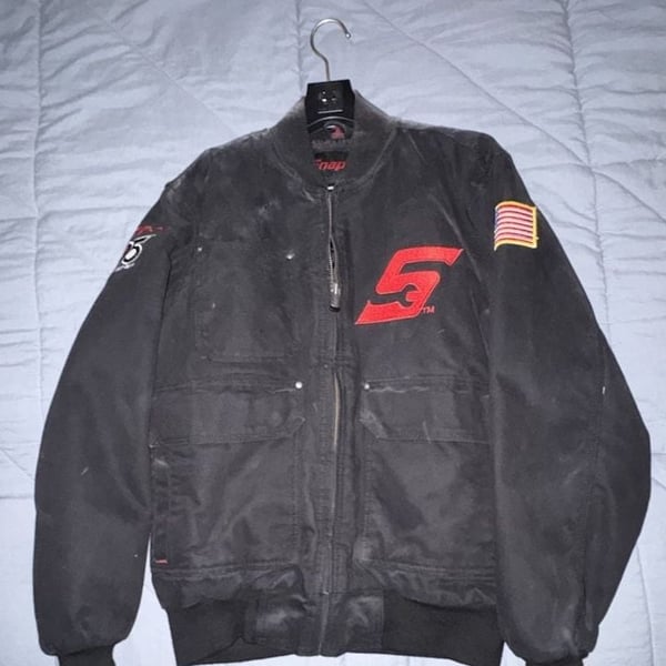 Snap-On 95th Anniversary Work Bomber Jacket Size S Black Quilt Lined. A little dusty but brand new