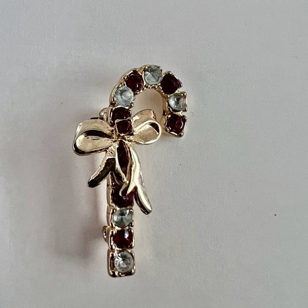 Gold Tone Rhinestone Candy Cane Brooch With Bow