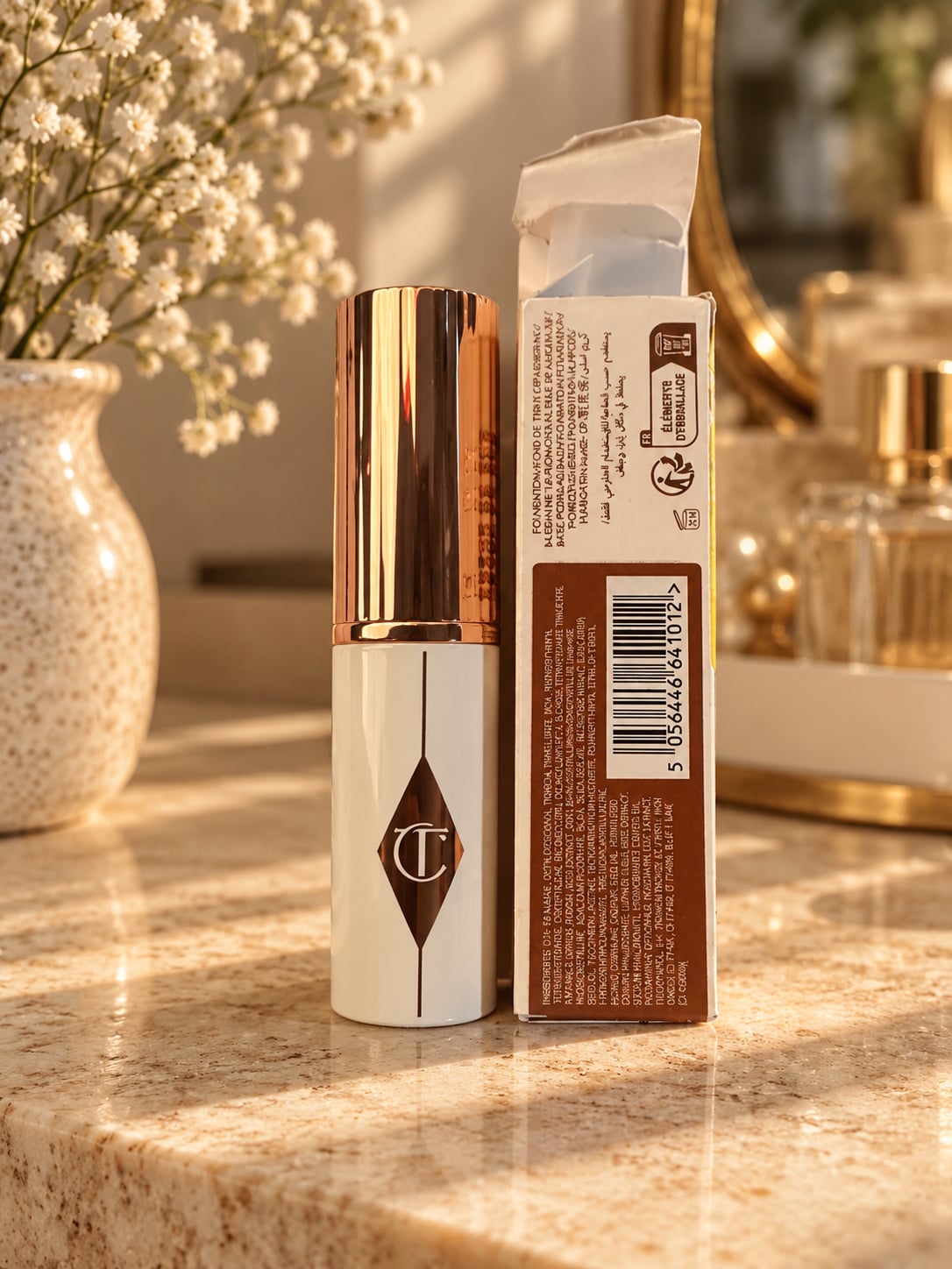 Charlotte Tilbury Unreal Skin Sheer Glow Tint 14 Deep Fonce 1
