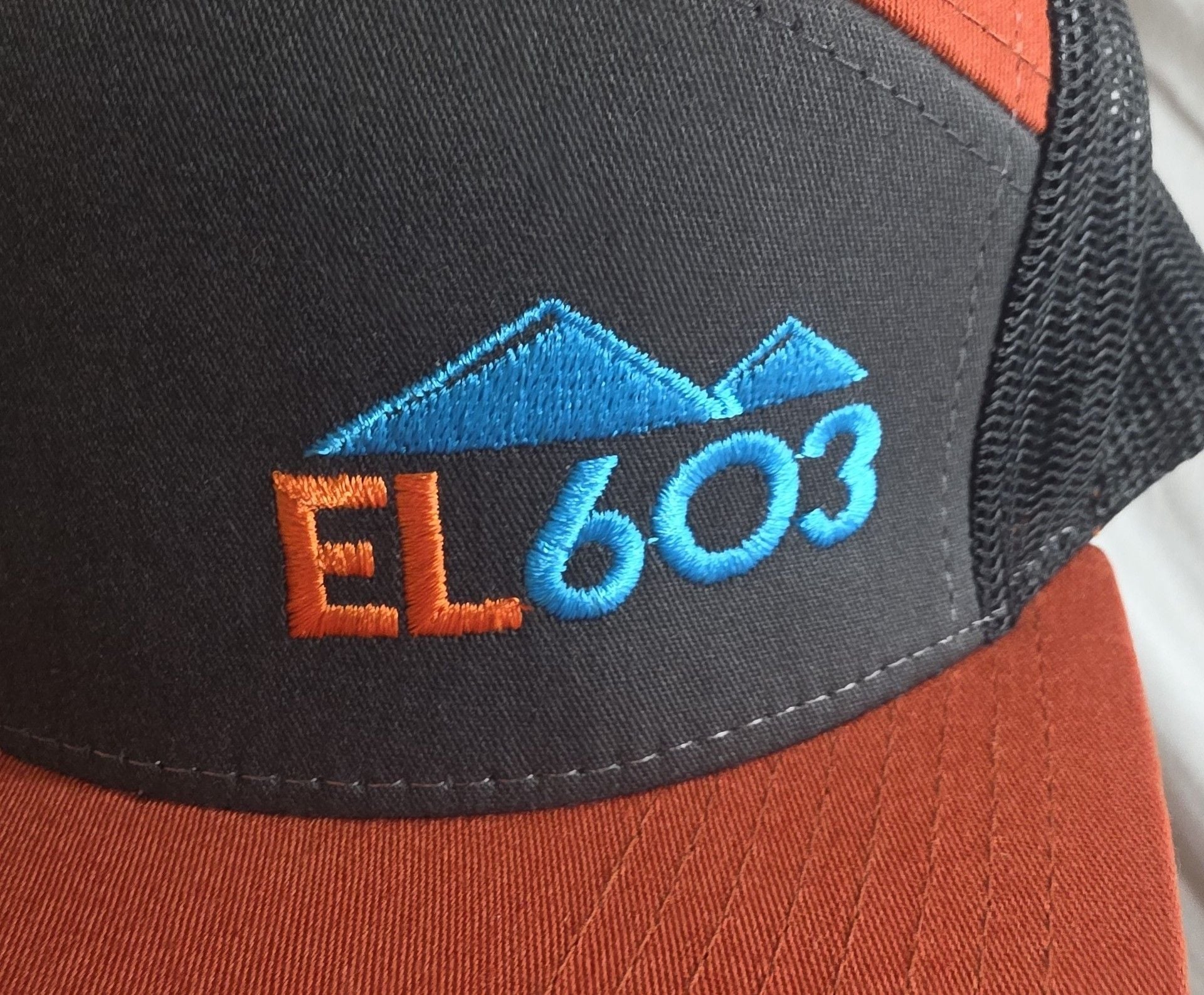 Quiver Water Edition 7P Flatbill Trucker Hat Orange Black 3