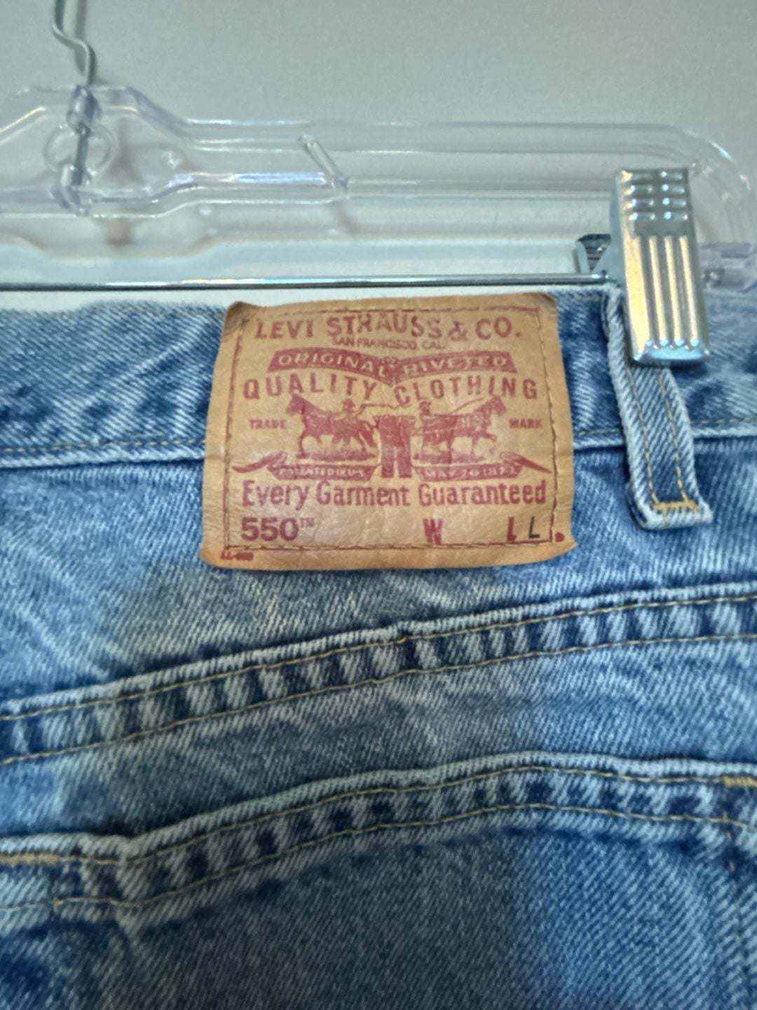 Vintage 2002 Levi's 550 Relaxed Fit Size 12 MIS L Light Wash length is 31 3