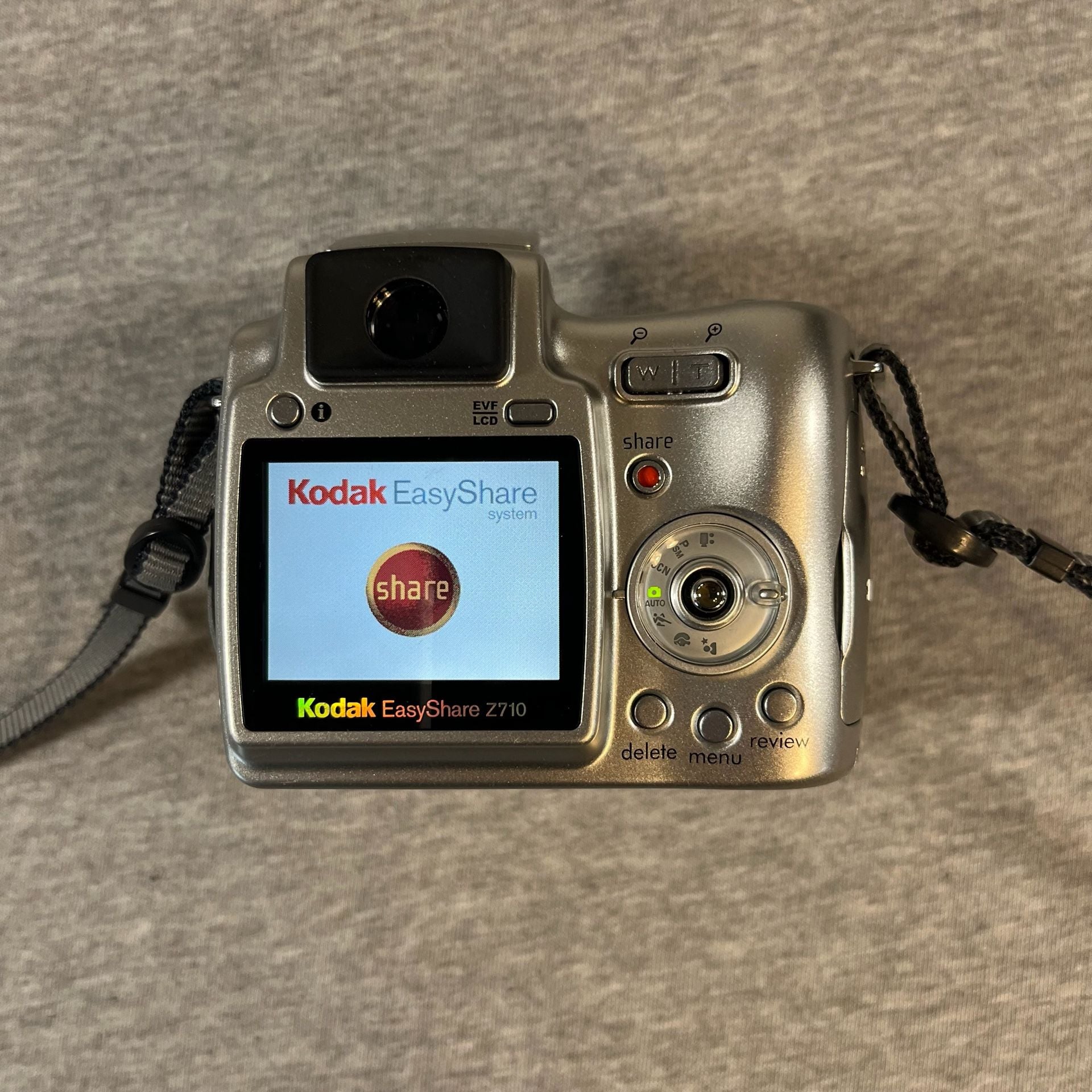 Kodak EasyShare Z710 Digital Camera Bundle with Bag, Tripod , Book & 12v cable 5