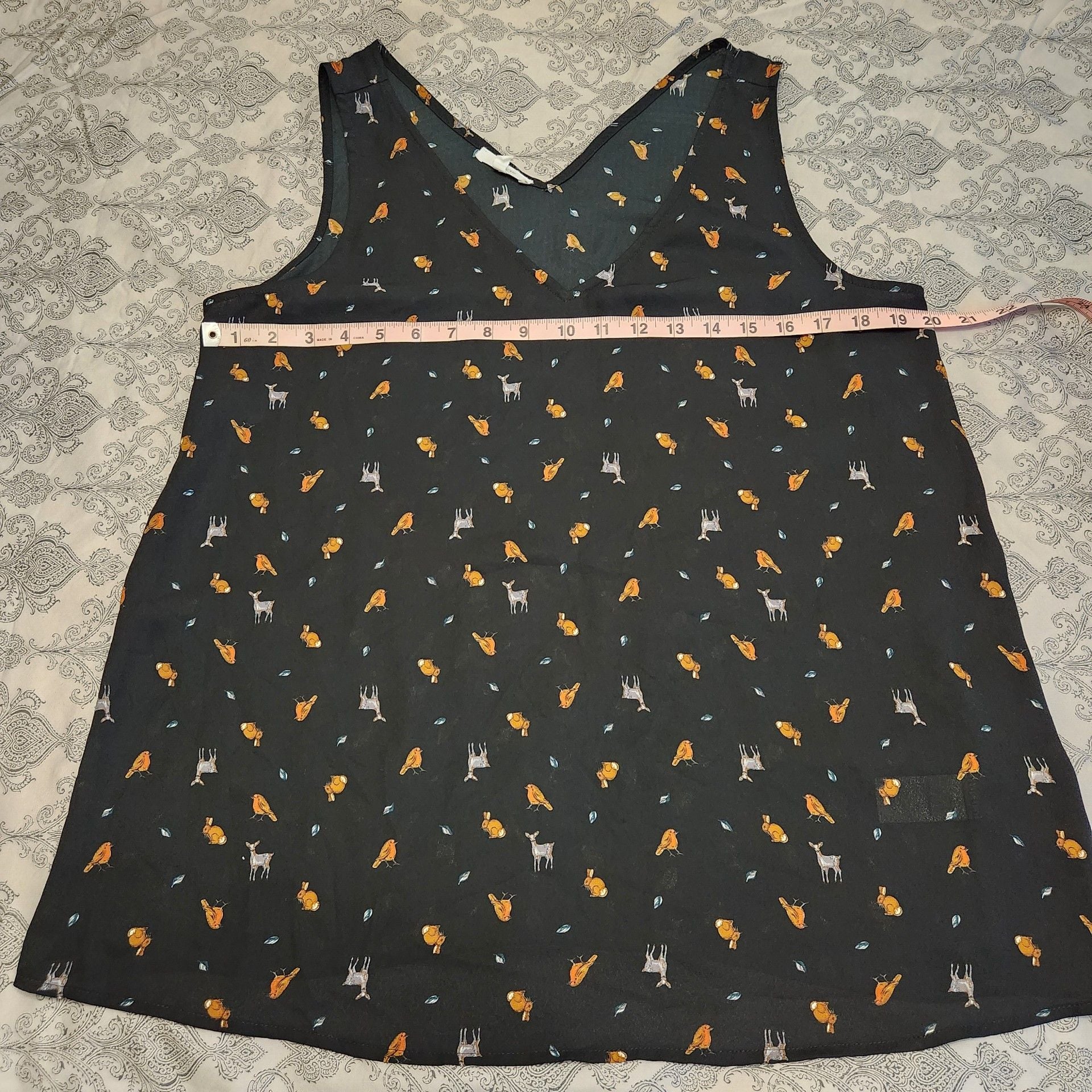Women's Sleeveless Animal Print V-Neck Blouse 8