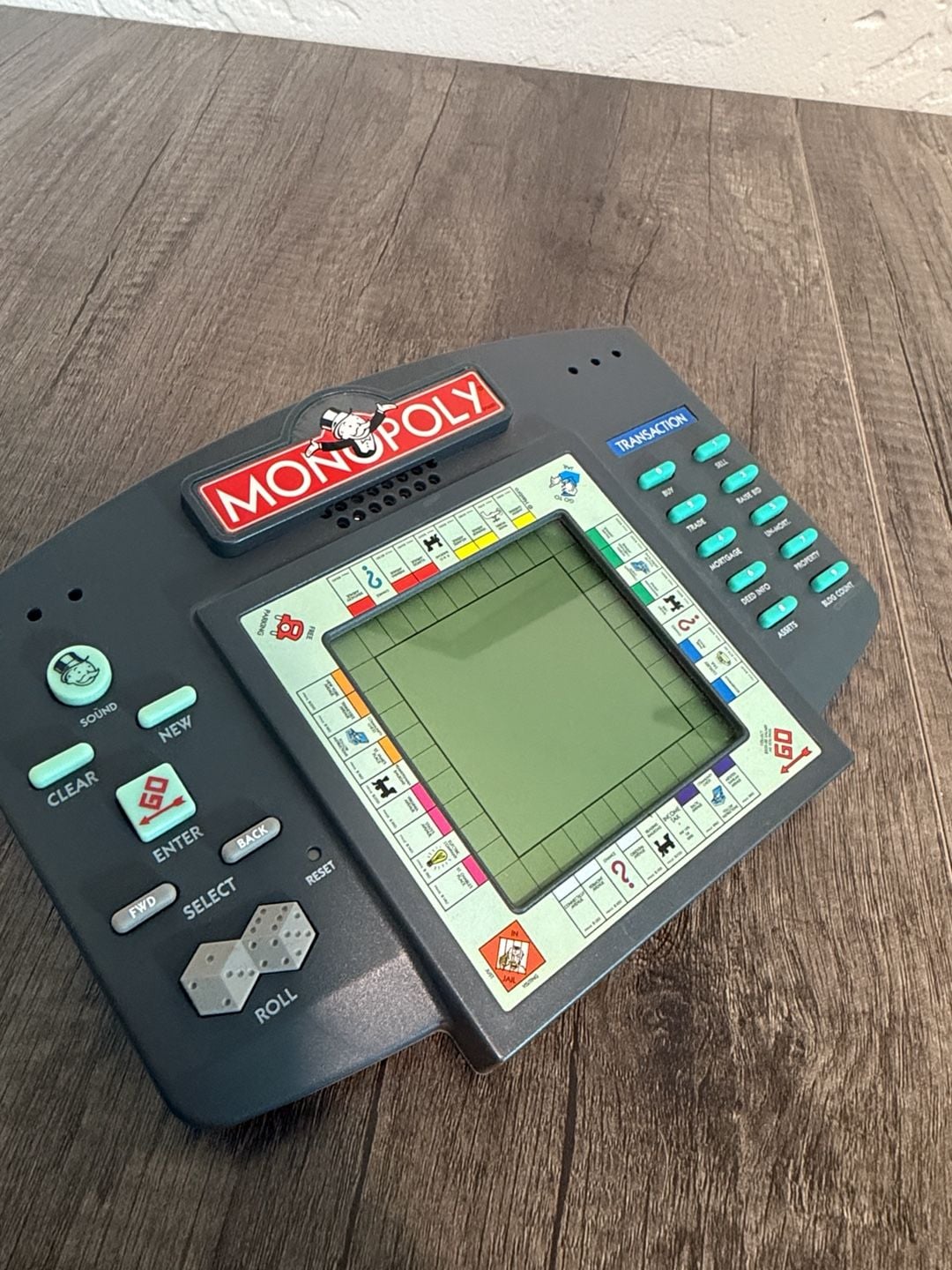 Hasbro Electronic Monopoly Handheld LCD Game Unit 1997 2
